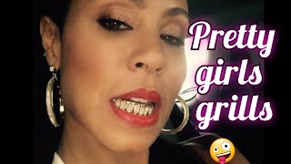 gold grillz on pretty girls gold teeth