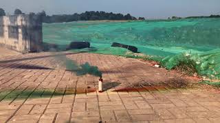 Pull string green smoke grenade