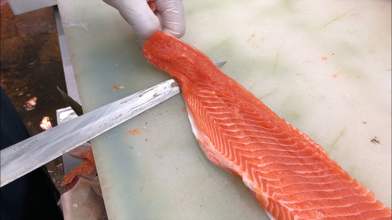 Japanese Street Food SALMON SASHIMI Japanese delicacy consisting of