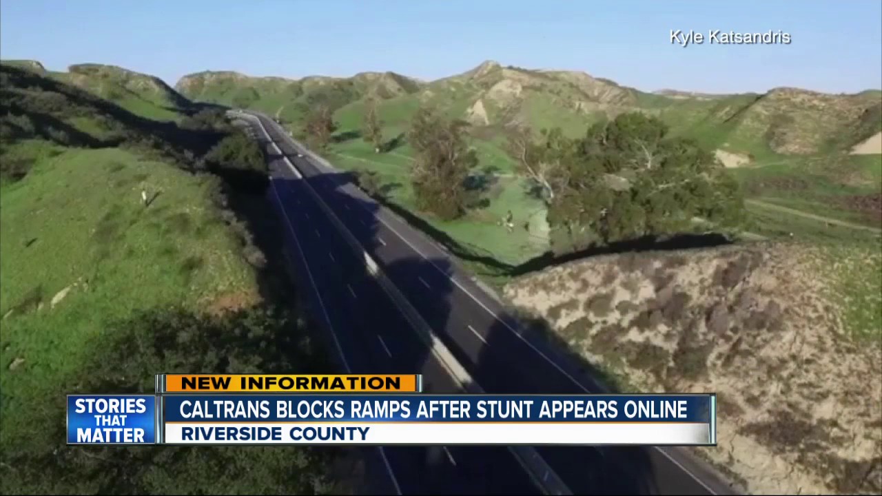 Motocross rider jumps Riverside freeway