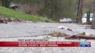 Flash flood damages homes and road in Boone County, W.Va.