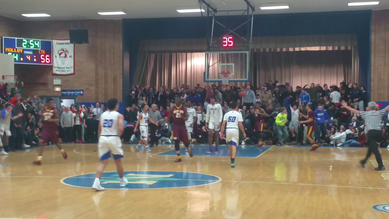 Dunk by Moses Brown assisted by Khalid Moore