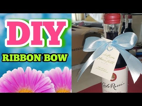 वीडियो: रिबन के साथ एक बोतल को कैसे सजाने के लिए