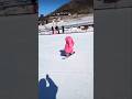a cute baby skating over ice ....