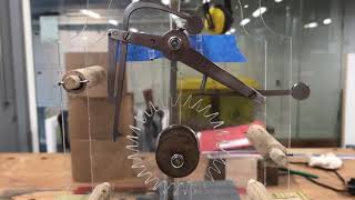 Twin pivot grasshopper escapement in metal experiments