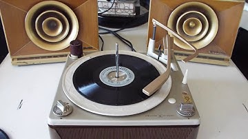 V-M automatic 4 speed record changer playing a 16-2/3 RPM LP record