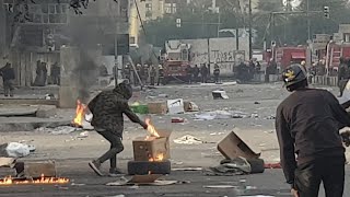 تقدم قوات الشغب الى ساحة التحرير قرب النفق واضراب قنابل المسيل والرصاص الحي احمد السراي