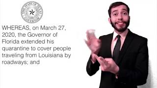 A latino bearded young male interpreter in black suit, white shirt,
and tie, interprets front of the state texas seal. on left side
screen...