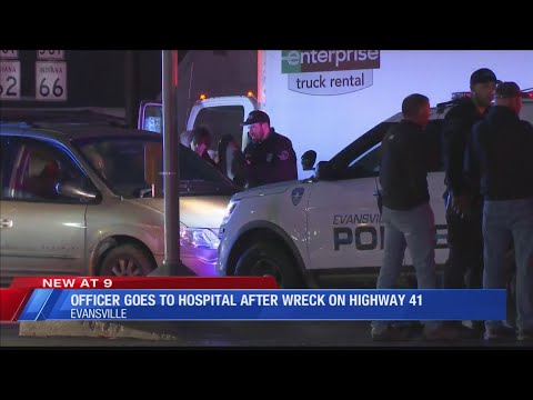 Truck runs red light, hits Evansville police cruiser