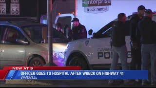 Truck runs red light, hits Evansville police cruiser