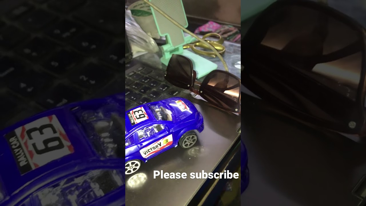 Small Blue Rc Car vs Brown Sun glasses