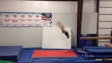 Julia Volpe Beam- punch front 1 1/2 dismount