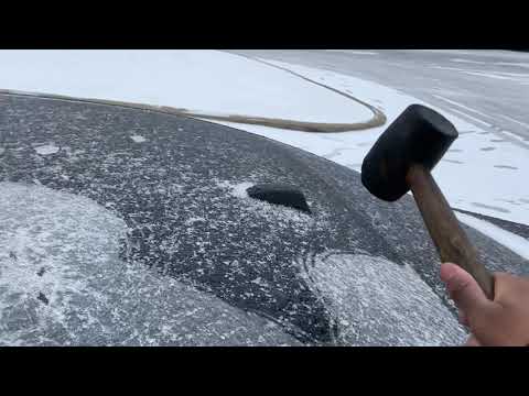 SCRAPING ICE OFF A CAR USING A MALLET!