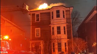 Firefighters battle 3-alarm fire in Boston triple-decker
