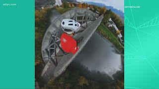 CHECK THIS OUT: Man rides on top of bridge arch without hesitation