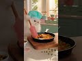 A Persian Cat is Cooking Vegetable Biryani