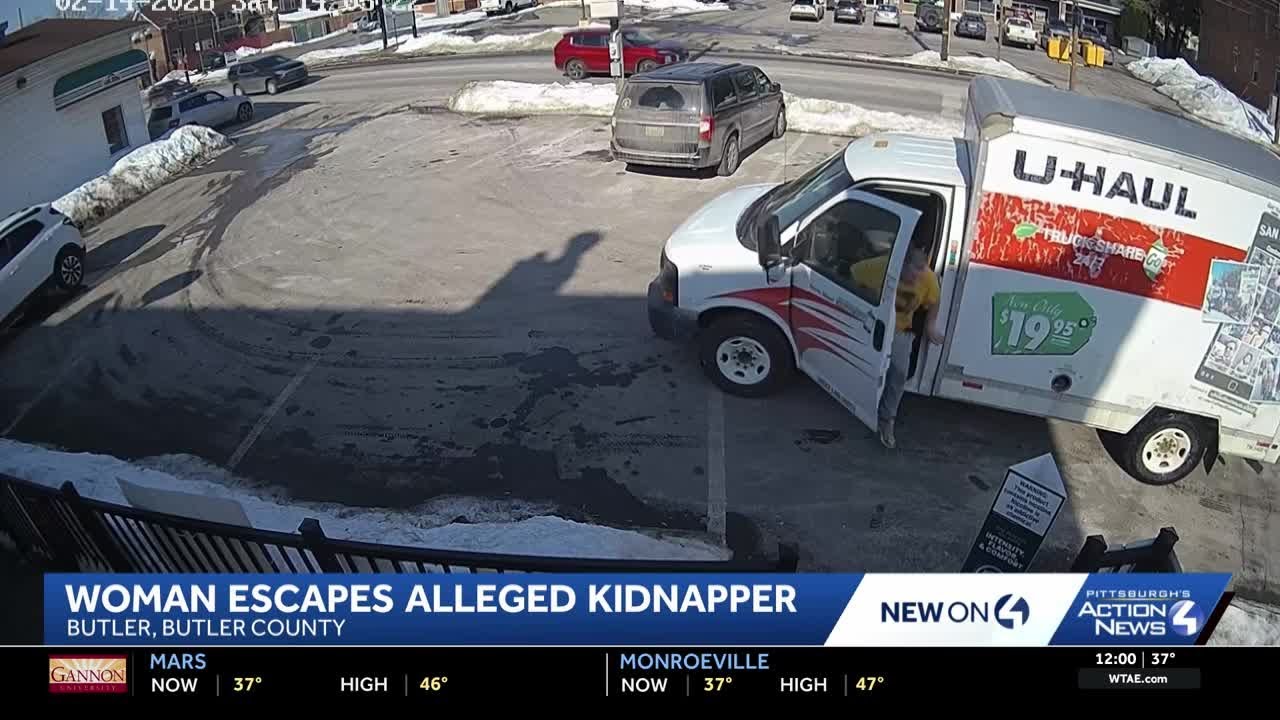 Dramatic video shows woman running into store as ex-boyfriend allegedly attempts to kidnap her