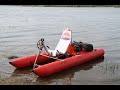 Pedal-power boat water bike catamaran with luggage carrier cargo. River travel and rafting. Test.