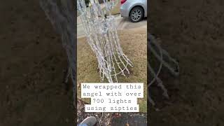 Christmas Angel wrapped with over 700 mini white lights #christmaslight #tips #minilights #yardart