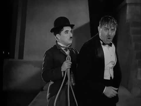 Download Charlie Chaplin funny scene  - saving a person from suicide  - City Lights 1931