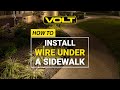 How to Run Wire Under a Sidewalk for Landscape Lighting