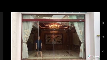cửa kính lùa bán tự động Nguyên Phong