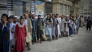 Thousands Queue At Kabuls Banks After Taliban Impose Withdrawals Cap