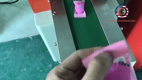 Automatic egg shape toy pillow type bag horizontal flow packing machine with hole punching function