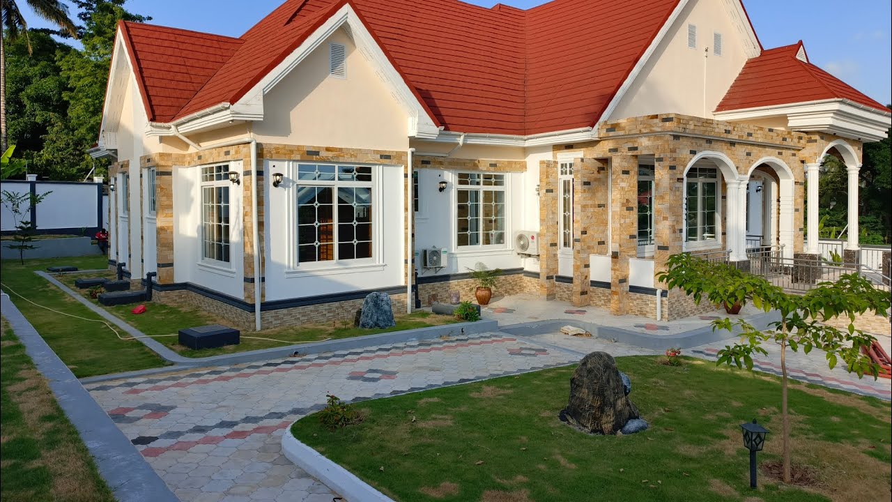 TSHS MILIONI (( 900,000,000 )) NYUMBA INA PATIKANA GOBA JUU ENEO SQMT 2200 UMILIKI HATI MILIKI