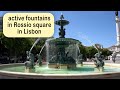 active fountains in Rossio square in Lisbon, 4k