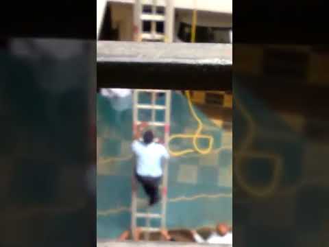 Pune: Girl falls off highrise and gets stuck in window grill; rescued by fire brigade-WATCH