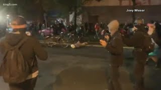 Criminal investigation requested after Seattle officer seen rolling bike over protester