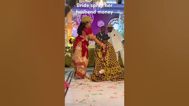 Bride spraying her husband money #wedding