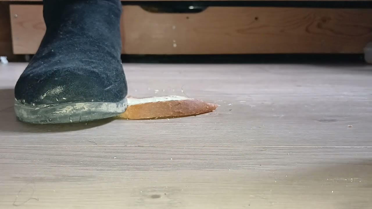 Crush bread under flat boot