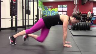 High Plank with Knee Crossover