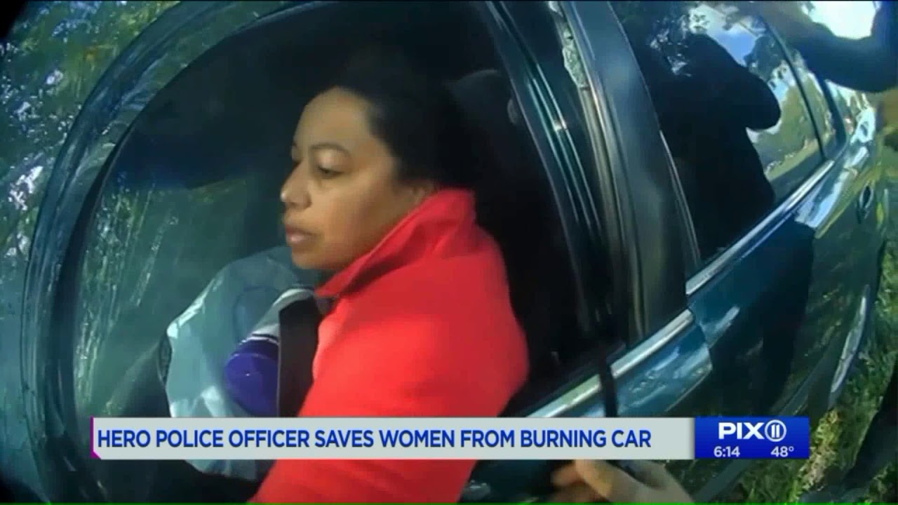 NJ police officer, good Samaritan free woman from burning car - YouTube