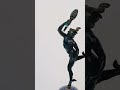 A Grand Tour Regency bronze figure of Mercury (Hermes) on a composite marble column