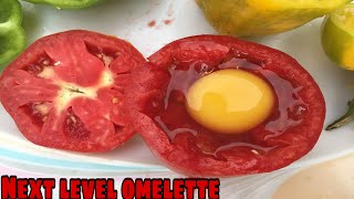 Omelette inside tomato & bell pepper. next level omelette made by Daniel Masood Tv.