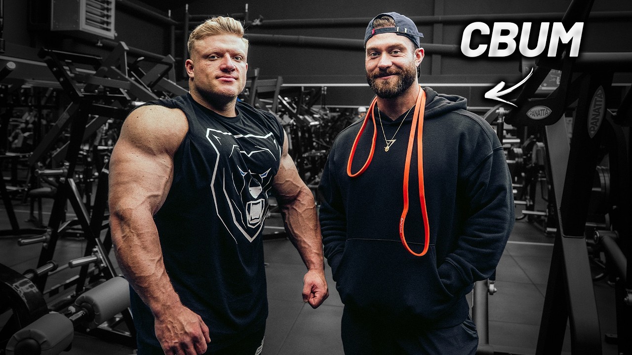 The first guest in my gym! Big arms w/ @Chris Bumstead