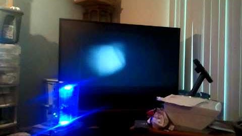 Clear Xbox 360 with Blue Lights and Controller