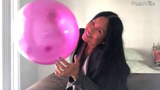 Purple Brisbane Broncos Balloon Blowing, Deflating And Playing With A Balloon