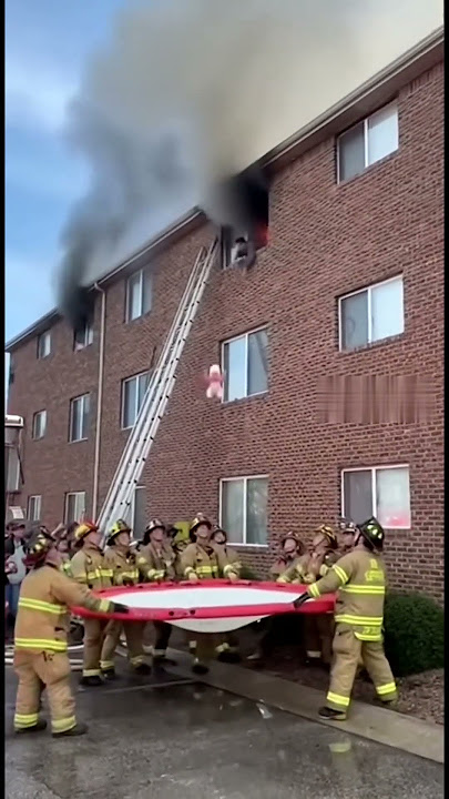 Witnesses at a Branson apartment filmed the moment firefighters caught a baby on a rescue trampoline