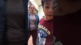 Boy and his mom do a TikTok dance and mom accidentally elbows boy on his