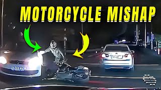Motorcycle Passenger Lands on Top of Car in an Unusual Collision