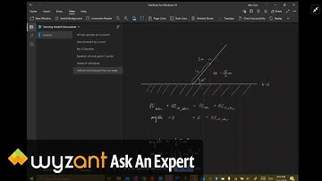 speed of the tip of a uniform rod as it passes the horizontal position (conservation of energy)