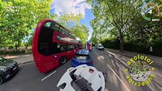 Filtering past thousands of cars. Oxford Street, Bayswater Road, Notting Hill Gate 20260704 1845