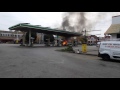 Police car catches fire at gas station