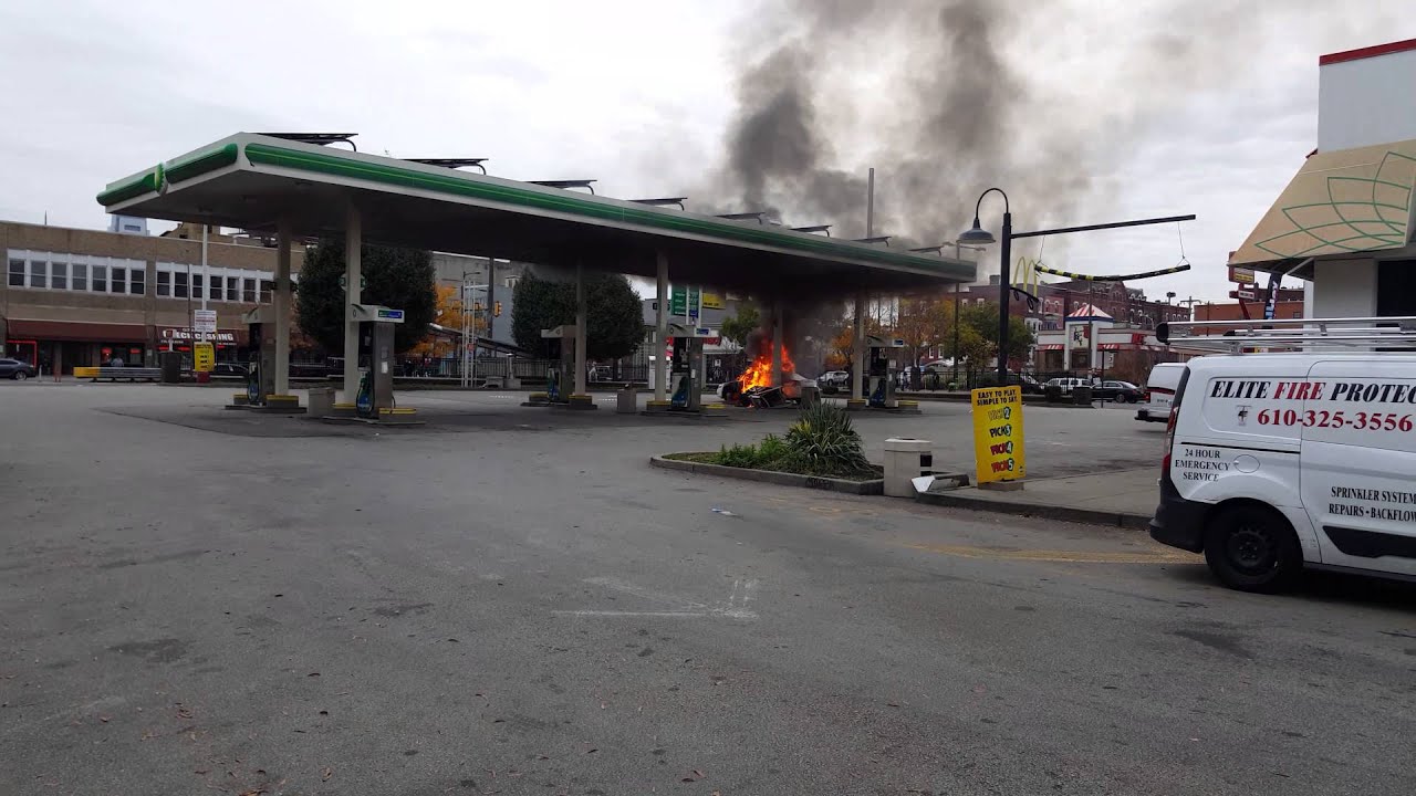 Police car catches fire at gas station YouTube