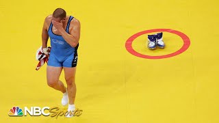 Ever Wonder: Why do wrestlers leave their shoes on the mat? | NBC Sports