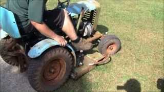 ANTIQUE PANZER MOWING GRASS